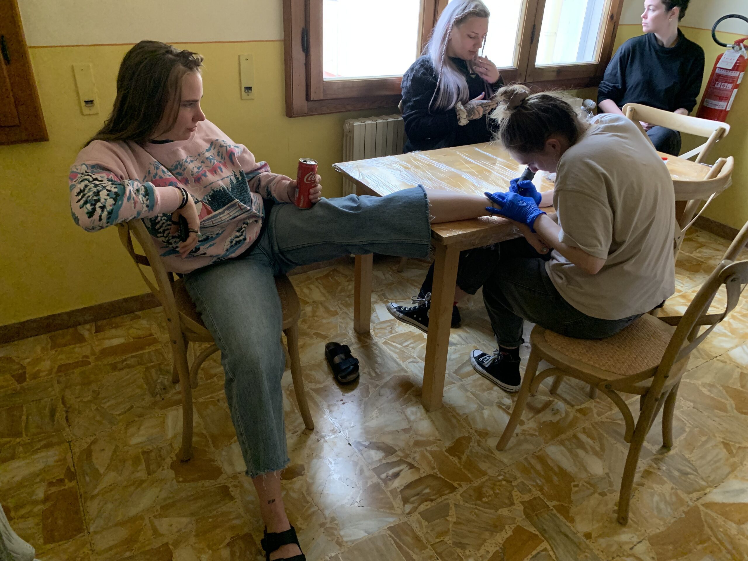 A group of women sitting at a table.