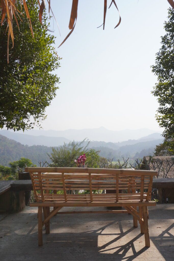 wooden bench, stone patio