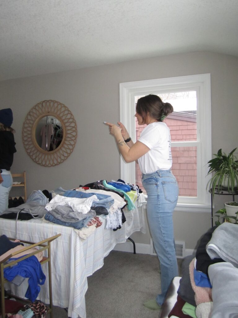 A woman standing in a room.